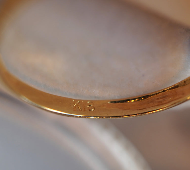 小さなルビーが可愛い デザインリング