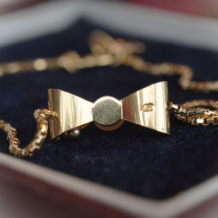 小さなパールが可愛い リボンブレスレット