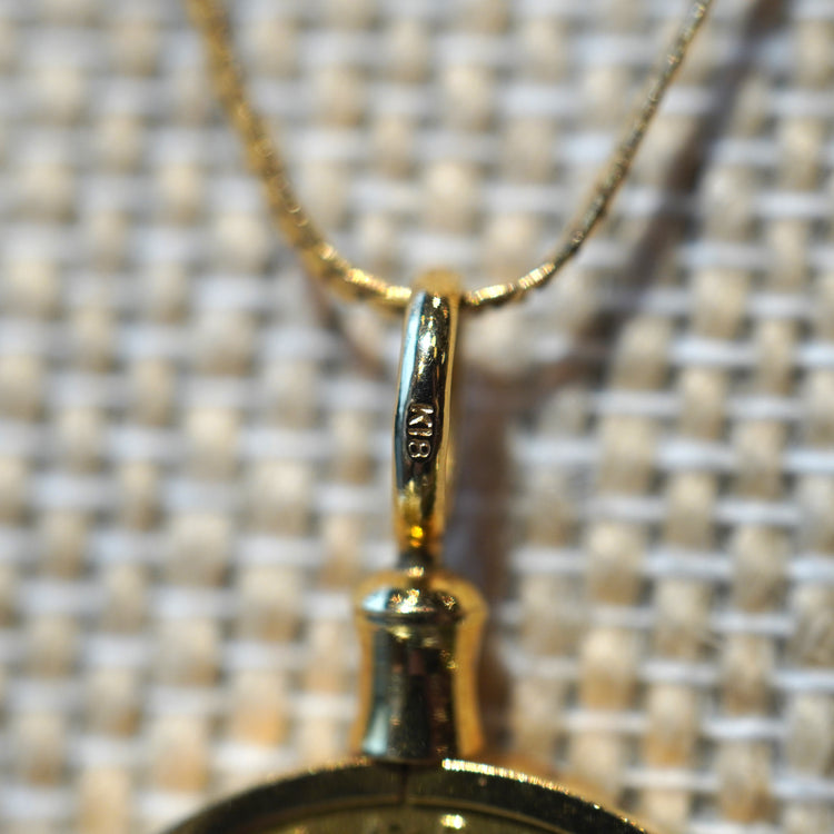 シンプルな 1/4ozメイプルコイントップ