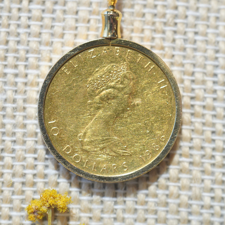 シンプルな 1/4ozメイプルコイントップ