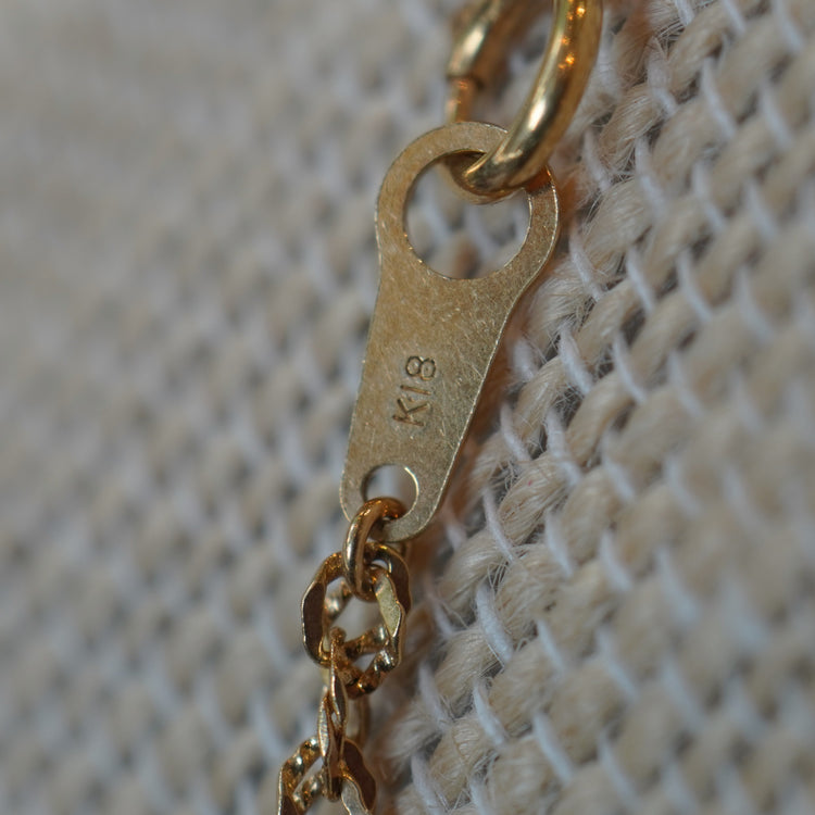 煌めきの美しい スクリューネックレス