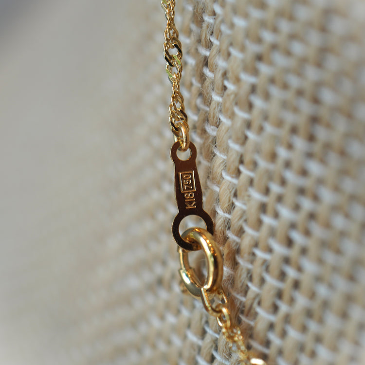 華奢な スクリューネックレス