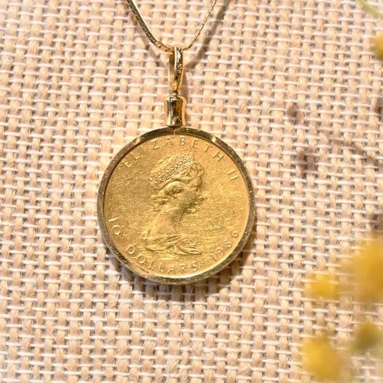 シンプルな 1/4ozメイプルコイントップ