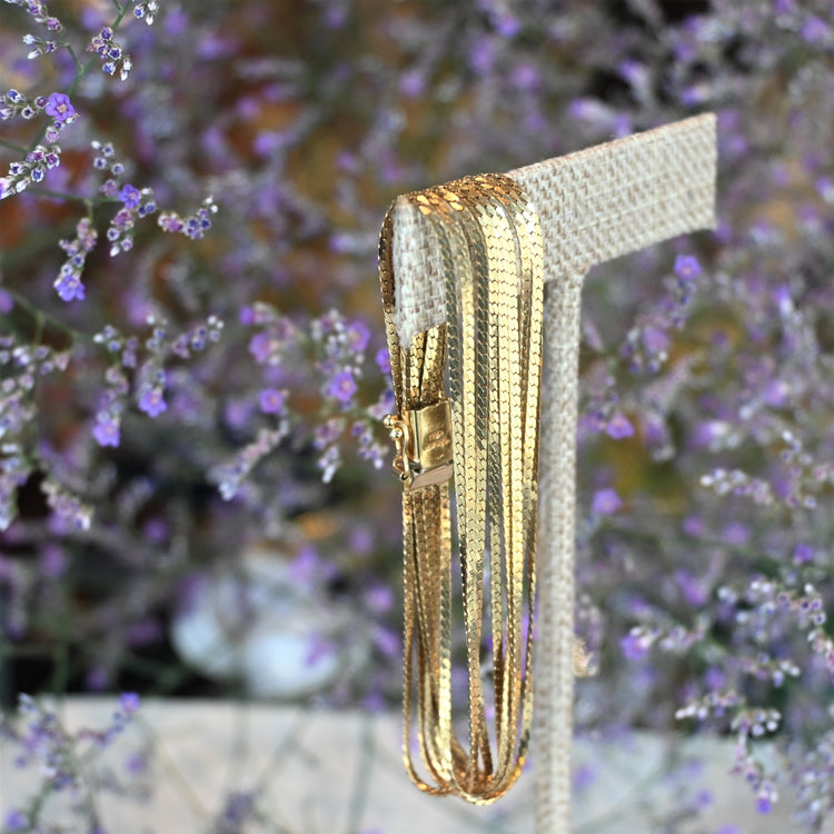 輝きの美しい9連 スネークブレスレット