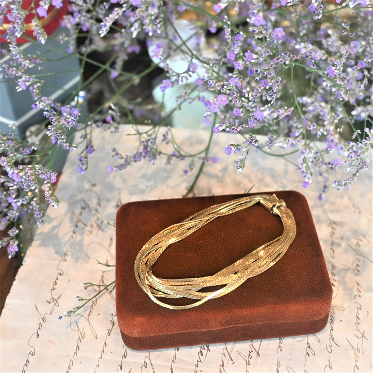 輝きの美しい9連 スネークブレスレット