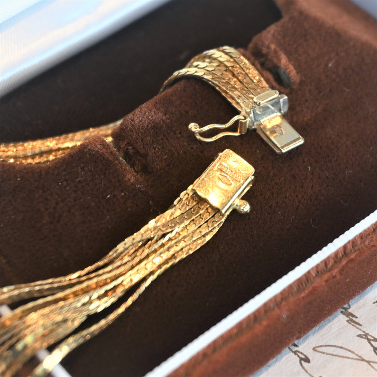 輝きの美しい9連 スネークブレスレット