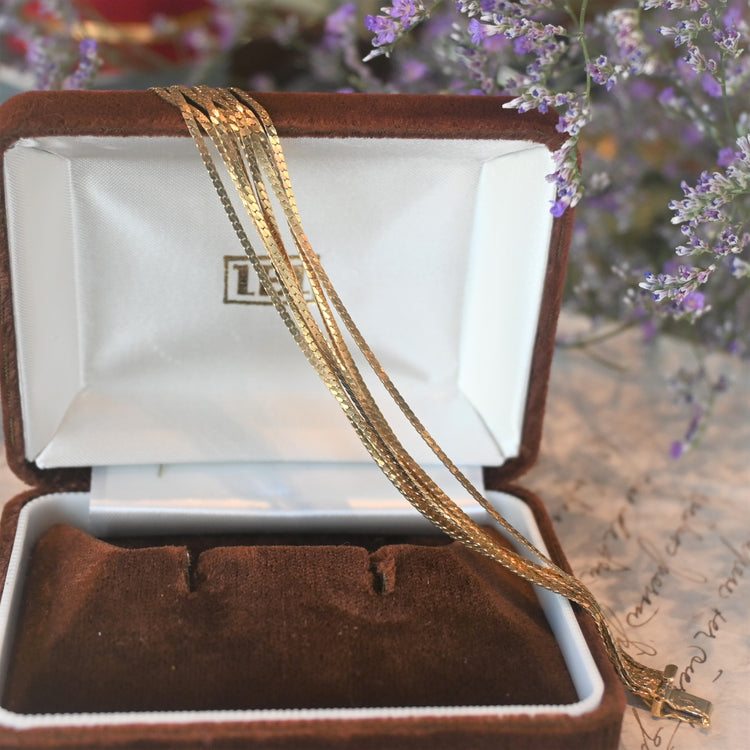 輝きの美しい9連 スネークブレスレット