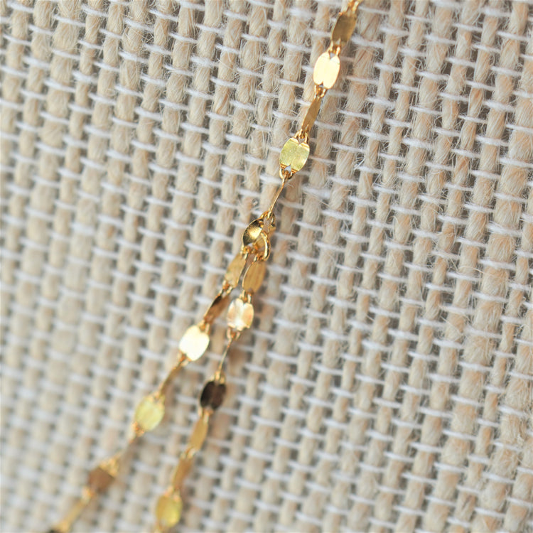 柔らかいゴールドの輝き　デザインネックレス